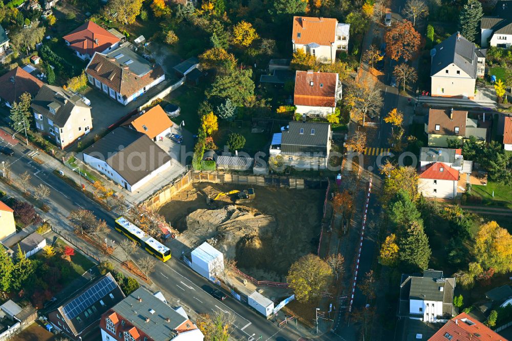 Berlin from the bird's eye view: Construction site for the new residential and commercial building on street Heinrich-Grueber-Strasse Ecke Bausdorfstrasse in the district Kaulsdorf in Berlin, Germany