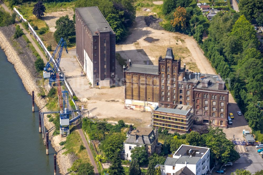 Duisburg from above - Construction site for the new residential and commercial building district Plangemuehle on the river Rhine in Alt-Homberg in the Ruhr area in the state of North Rhine-Westphalia, Germany