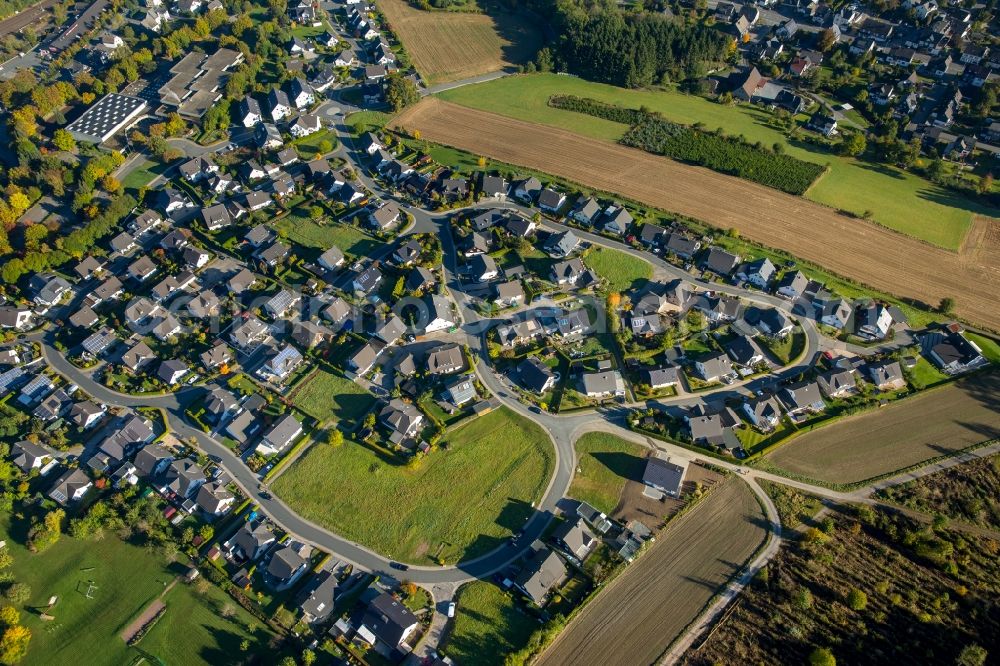 Bestwig from the bird's eye view: New construction residential area of detached housing estate Fliederweg corner Ginsterweg in Bestwig in the state North Rhine-Westphalia