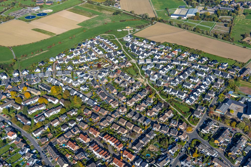 Moers from above - Construction sites for new construction residential area of detached housing estate along Planetenstrasse in Moers in the state of North Rhine-Westphalia