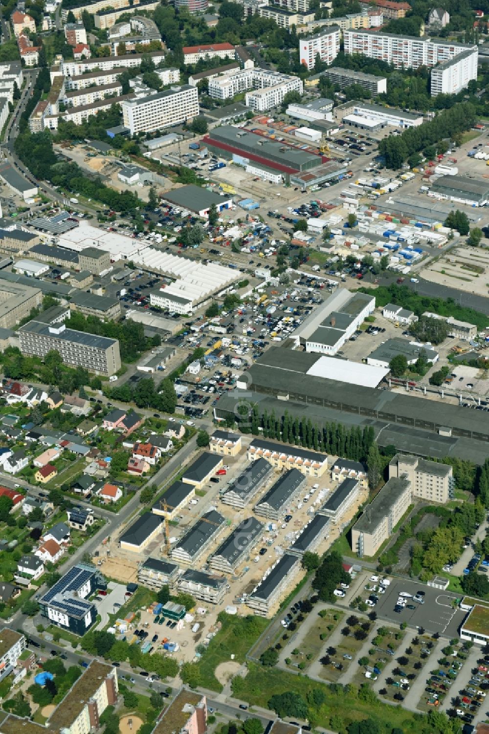 Aerial photograph Berlin - Construction site of a new residential area of the terraced housing estate on the Arendscarree on Arendstrasse corner Lichtenauer Strasse - Schleizer Strasse in the district Hohenschoenhausen in Berlin, Germany