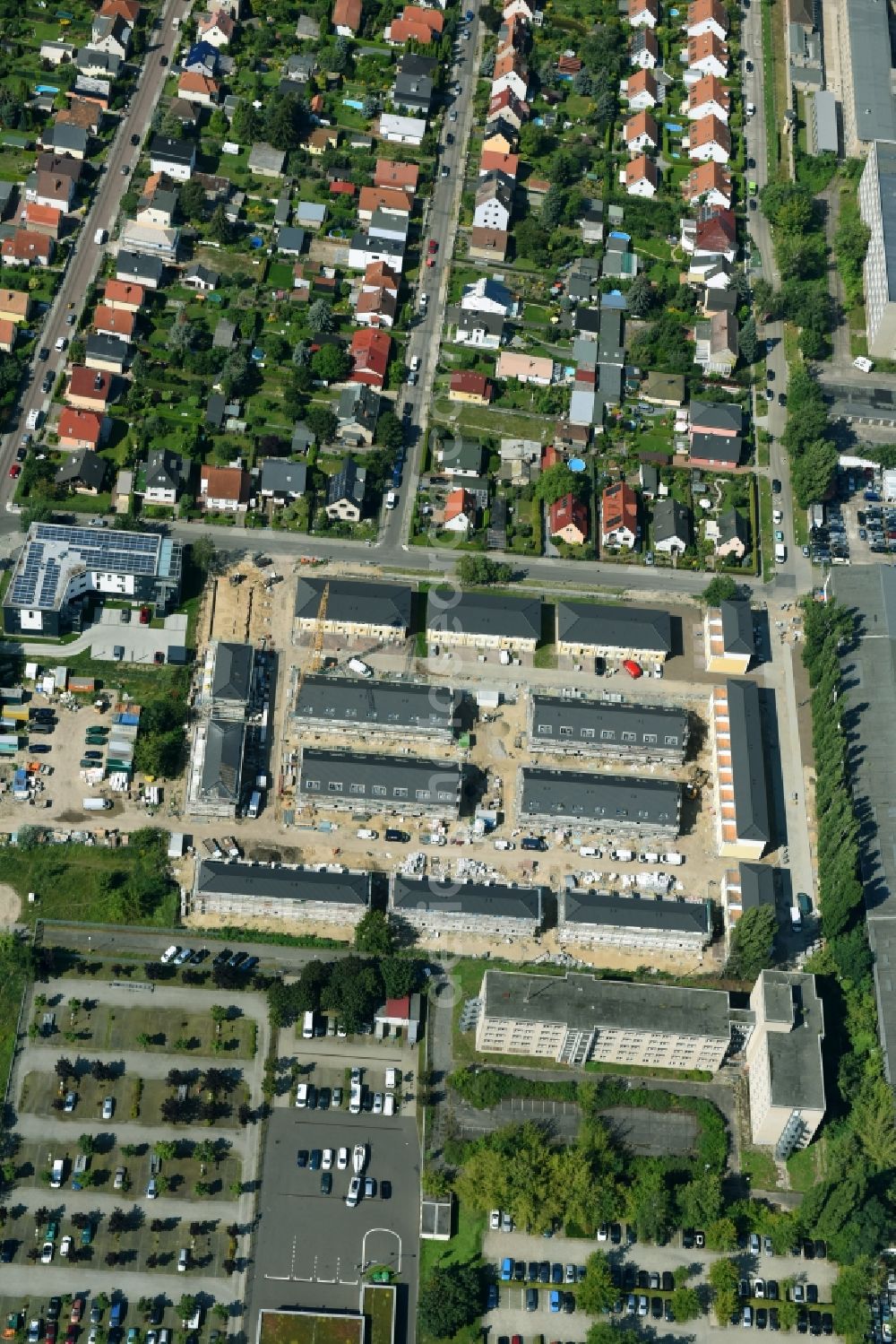 Aerial image Berlin - Construction site of a new residential area of the terraced housing estate on the Arendscarree on Arendstrasse corner Lichtenauer Strasse - Schleizer Strasse in the district Hohenschoenhausen in Berlin, Germany