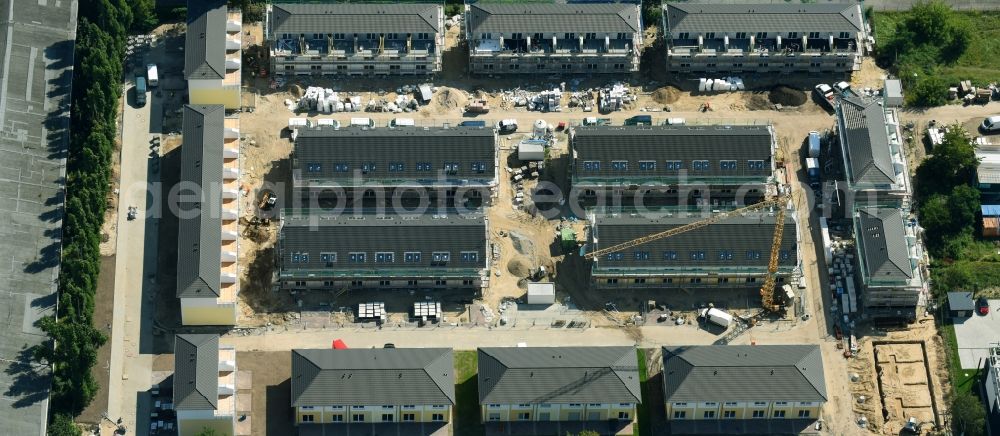 Aerial image Berlin - Construction site of a new residential area of the terraced housing estate on the Arendscarree on Arendstrasse corner Lichtenauer Strasse - Schleizer Strasse in the district Hohenschoenhausen in Berlin, Germany