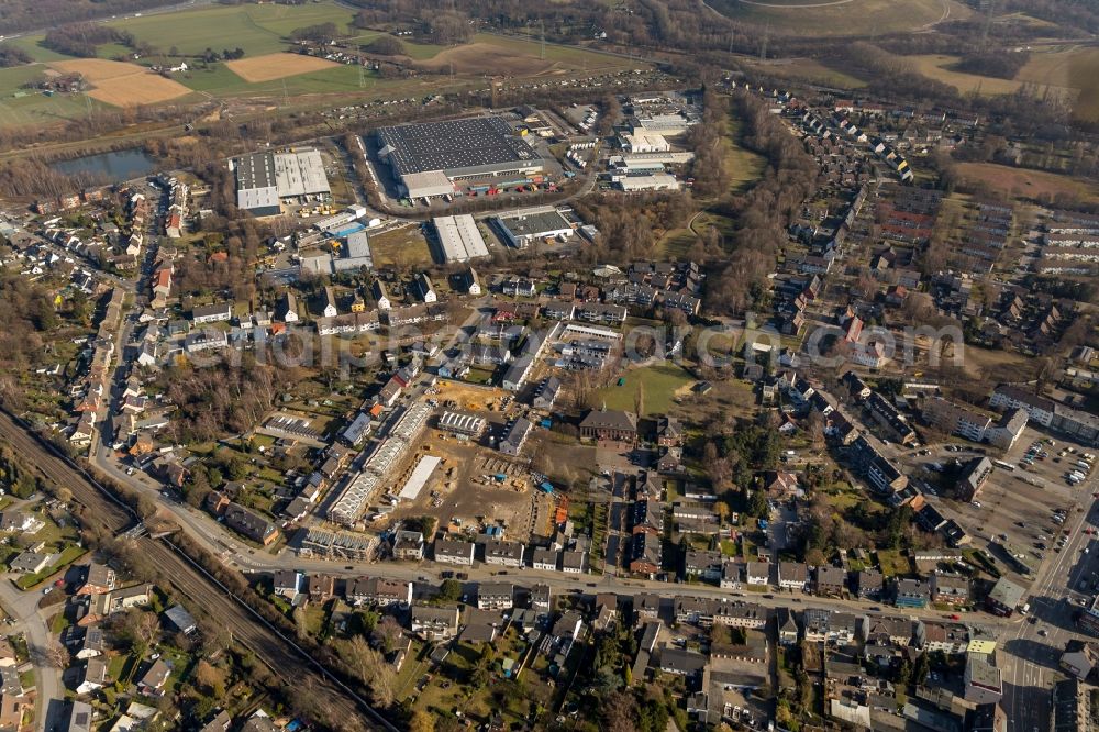 Aerial photograph Bottrop - Construction site of a new residential area of the terraced housing estate of Deutsche Reihenhaus AG on Bergendahlstrasse - Heimannstrasse in Bottrop in the state North Rhine-Westphalia, Germany