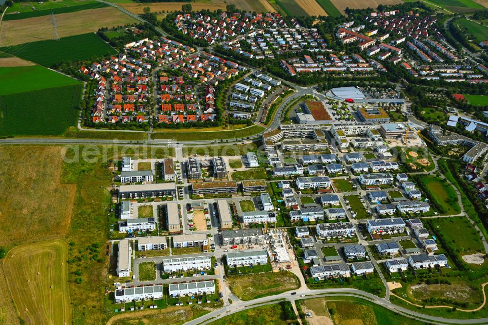 Erlangen from the bird's eye view: Construction site of a new residential area of the terraced housing estate on street Adenauerring in the district Buechenbach in Erlangen in the state Bavaria, Germany