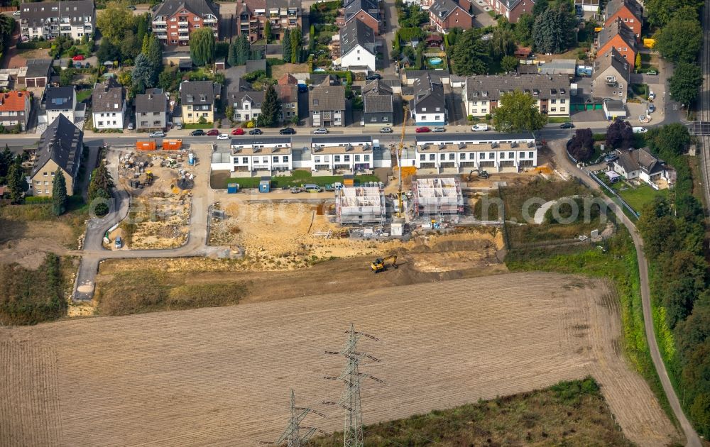 Gelsenkirchen from the bird's eye view: Construction site of a new residential area of the terraced housing estate on the Am Prangebach in Gelsenkirchen in the state North Rhine-Westphalia, Germany