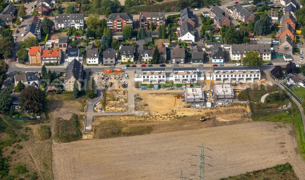 Aerial image Gelsenkirchen - Construction site of a new residential area of the terraced housing estate on the Am Prangebach in Gelsenkirchen in the state North Rhine-Westphalia, Germany