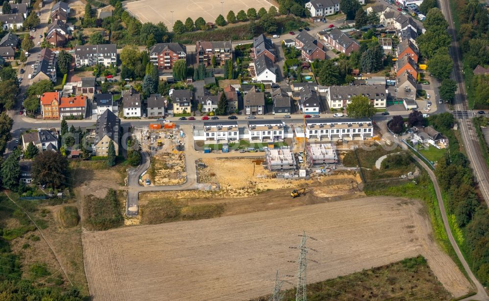 Aerial photograph Gelsenkirchen - Construction site of a new residential area of the terraced housing estate on the Am Prangebach in Gelsenkirchen in the state North Rhine-Westphalia, Germany