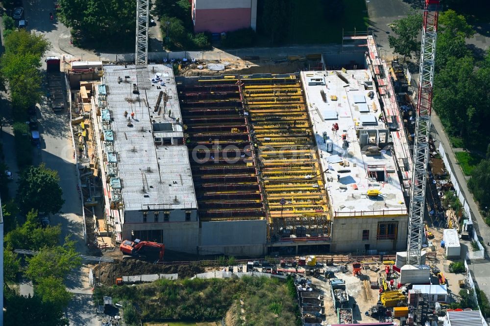 Berlin from the bird's eye view: Construction site for the multi-family residential building on Marchwitzastrasse in the district Marzahn in Berlin, Germany