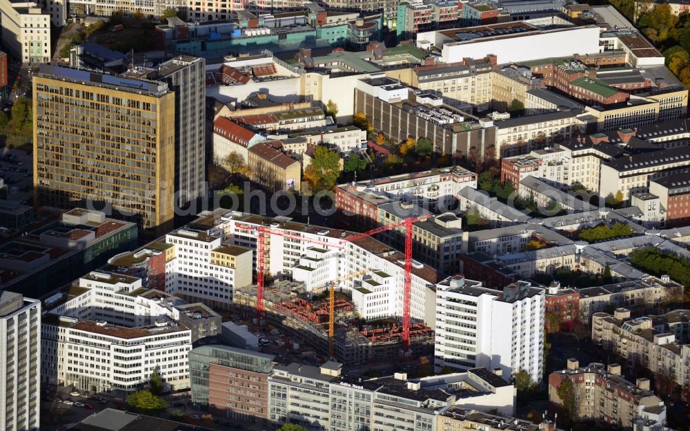 Aerial image Berlin - Construction site for the development of residential highrises at Markgrafenpark in Berlin. The building complex on the border of the districts Mitte and Kreuzberg is planned by the Land Union Group