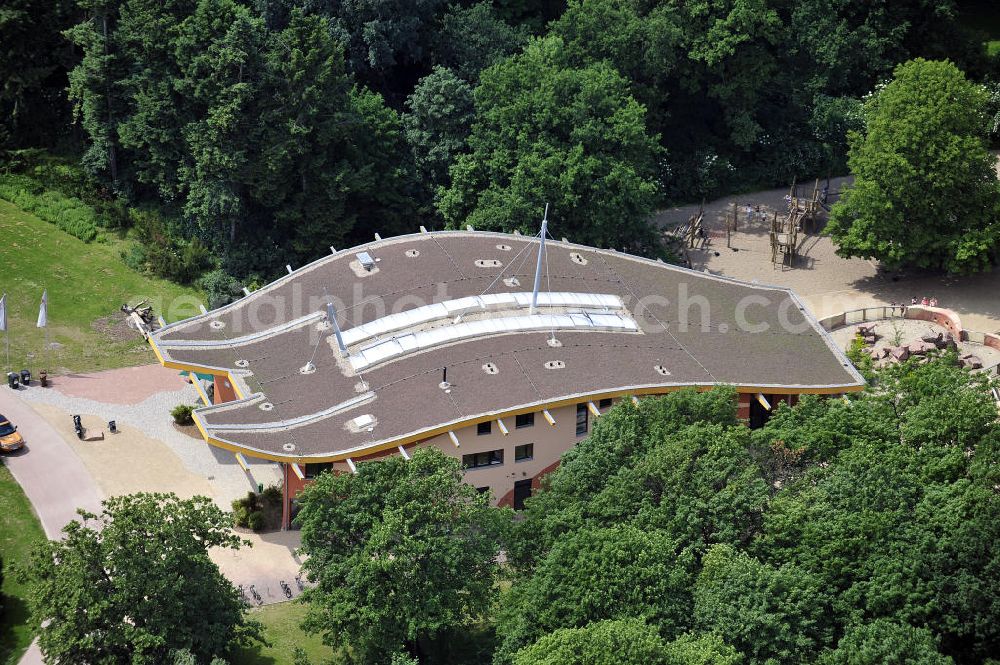 Magdeburg from above - Blick auf den Neubau Zoowelle, den Hauptein- und ausgang des Magdeburger Zoos. Das Bauwerk mit dem rechts angrenzenden Erdmännchengehege wurde 2009 eröffnet. Look at the new Zoowelle, the main entrance and exit of the Magdeburg Zoo. The building with the adjacent right Erdmännchengehege was opened in 2009.