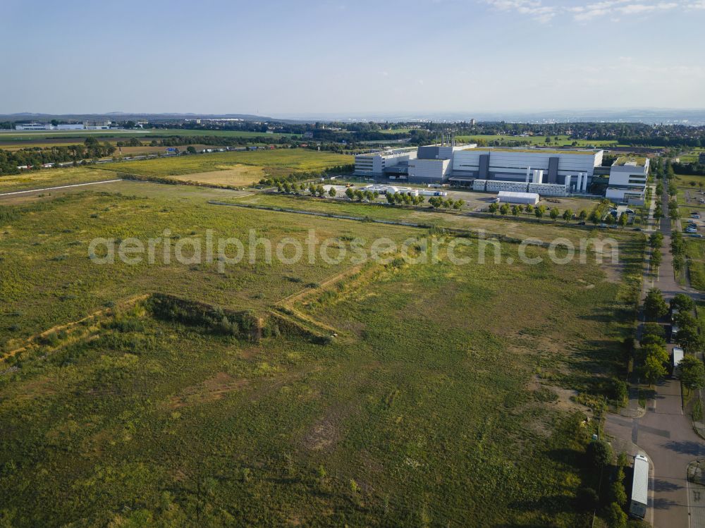 Dresden from the bird's eye view: New construction site of the production halls of the factory premises of a semiconductor and chip factory of the ESMC - European Semiconductor Manufacturing Company on Knappsdorfer Strasse in the district of Klotzsche in Dresden in the federal state of Saxony, Germany