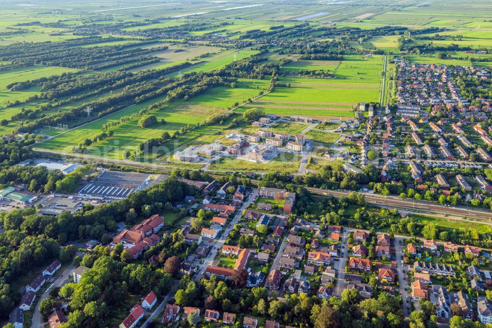 Buxtehude from the bird's eye view: Construction site to build a new multi-family residential complex Koengsdamm in Buxtehude in the state Lower Saxony, Germany