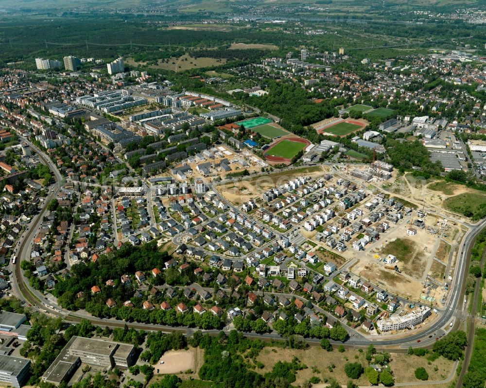 Mainz from above - New developments and residential estates in the Gonsenheim district of Mainz in the state of Rhineland-Palatinate. The second-largest district of Mainz is located in the Northwest of the city and is surrounded by the federal motorways A60 and A643. On its western edge, there are wooded areas. The district includes several sports facilities and residential estates