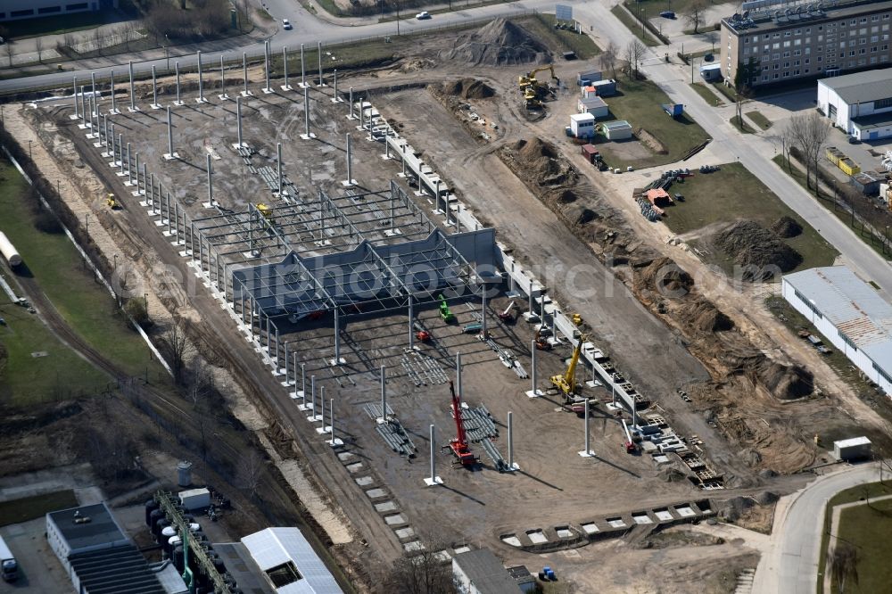 Aerial image Hoppegarten - Construction site with piling works for the foundation slab of a new building einer Logistikhalle der Hoppegarten Park Property GmbH & Co.KG an der Industriestrasse in Hoppegarten in the state Brandenburg