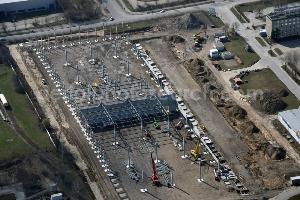 Aerial photograph Hoppegarten - Construction site with piling works for the foundation slab of a new building einer Logistikhalle der Hoppegarten Park Property GmbH & Co.KG an der Industriestrasse in Hoppegarten in the state Brandenburg