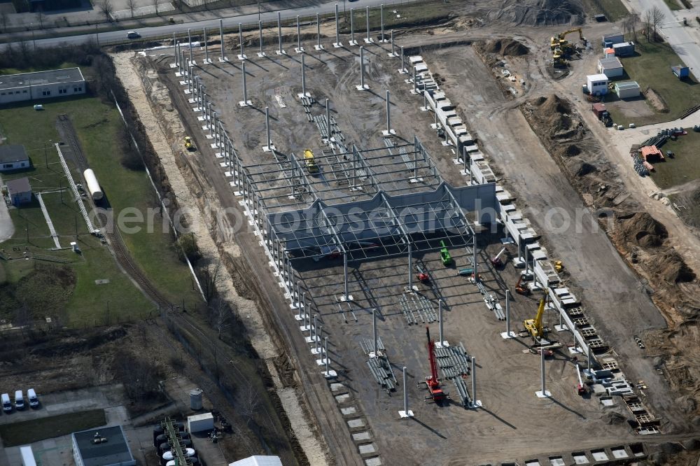 Hoppegarten from above - Construction site with piling works for the foundation slab of a new building einer Logistikhalle der Hoppegarten Park Property GmbH & Co.KG an der Industriestrasse in Hoppegarten in the state Brandenburg