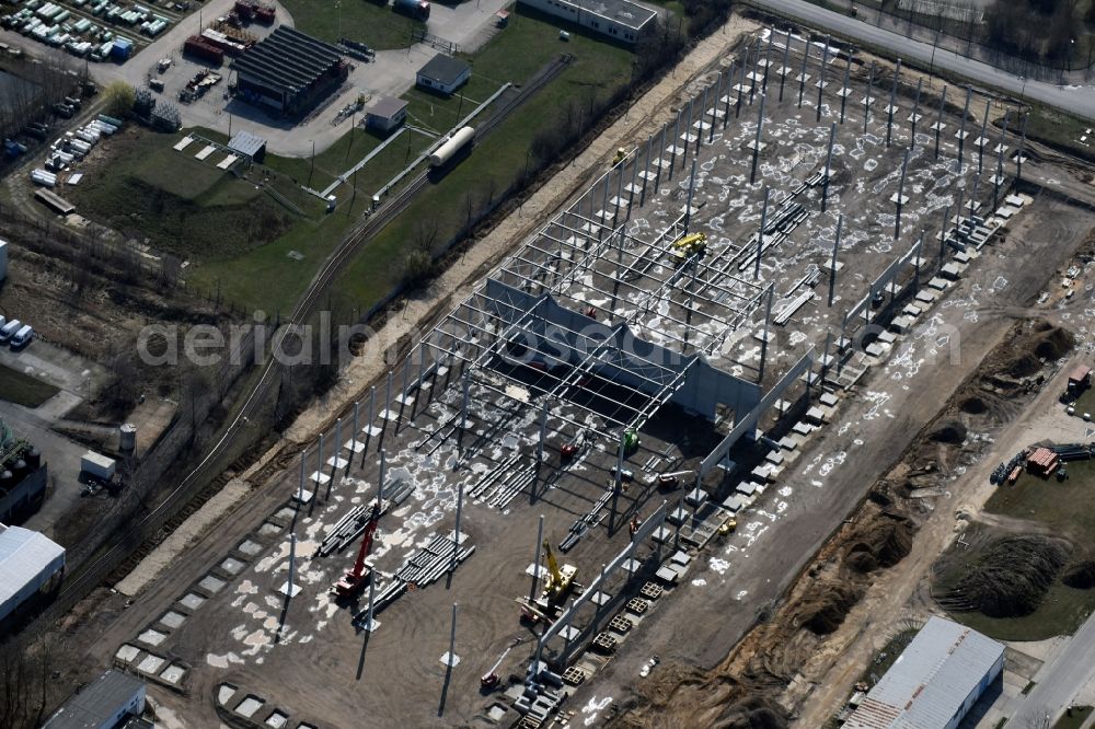 Aerial photograph Hoppegarten - Construction site with piling works for the foundation slab of a new building einer Logistikhalle der Hoppegarten Park Property GmbH & Co.KG an der Industriestrasse in Hoppegarten in the state Brandenburg