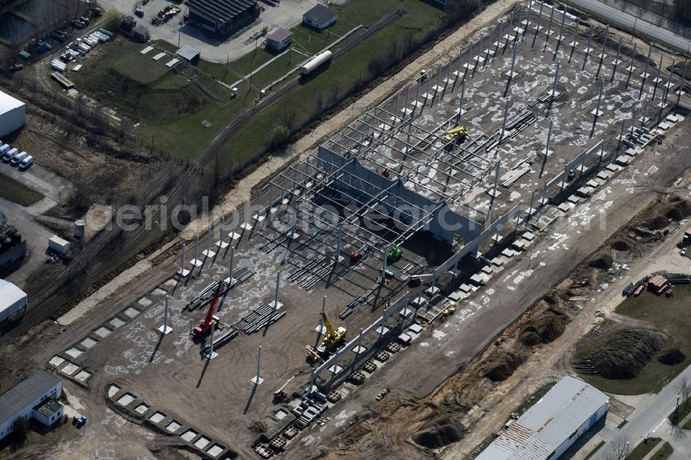 Hoppegarten from above - Construction site with piling works for the foundation slab of a new building einer Logistikhalle der Hoppegarten Park Property GmbH & Co.KG an der Industriestrasse in Hoppegarten in the state Brandenburg