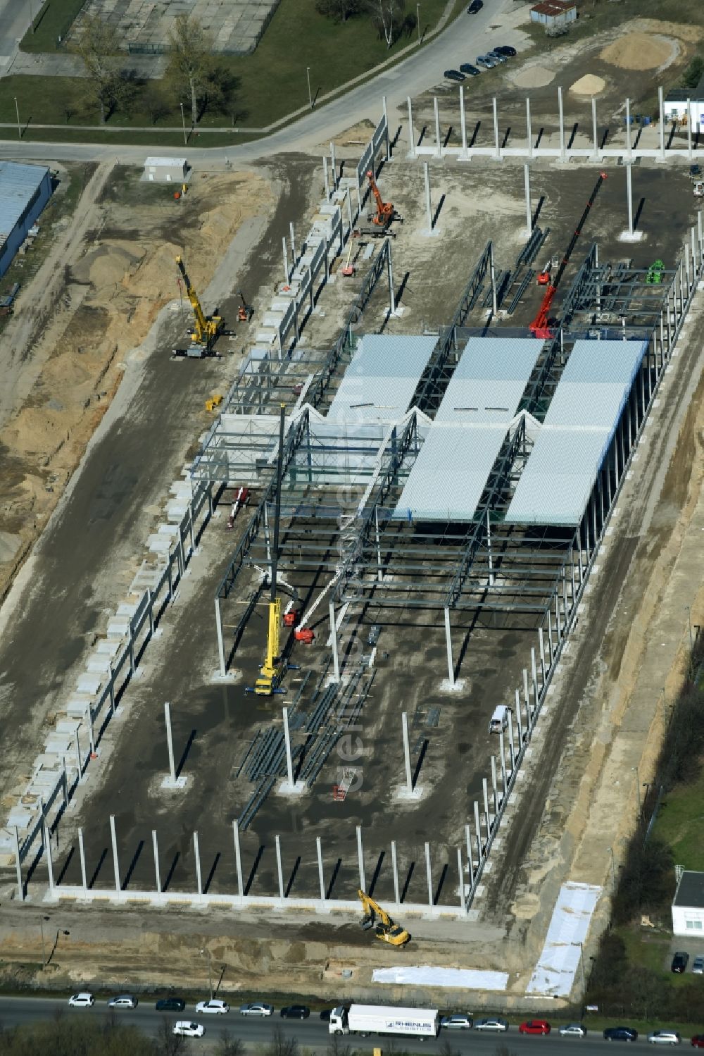 Aerial image Hoppegarten - Construction site with piling works for the foundation slab of a new building einer Logistikhalle der Hoppegarten Park Property GmbH & Co.KG an der Industriestrasse in Hoppegarten in the state Brandenburg