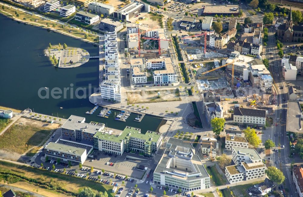 Dortmund from the bird's eye view: New residential buildings at the lake Phoenixsee beneath the roads Hoerder-Bach-Allee and Am Kai in Dortmund in North Rhine-Westphalia