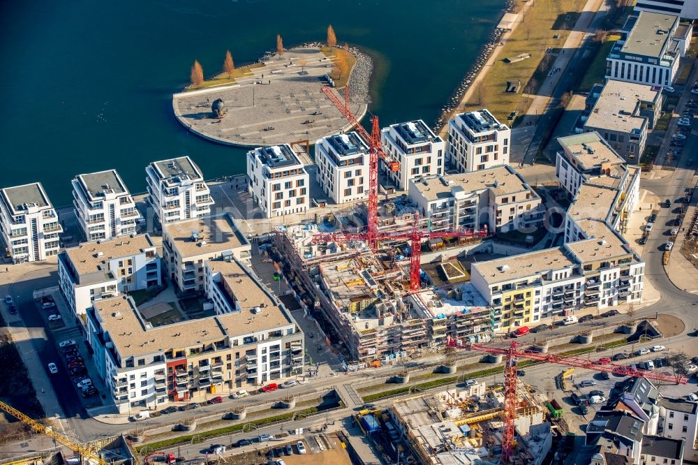 Dortmund from the bird's eye view: New residential buildings at the lake Phoenixsee beneath the roads Hoerder-Bach-Allee and Am Kai in Dortmund in North Rhine-Westphalia