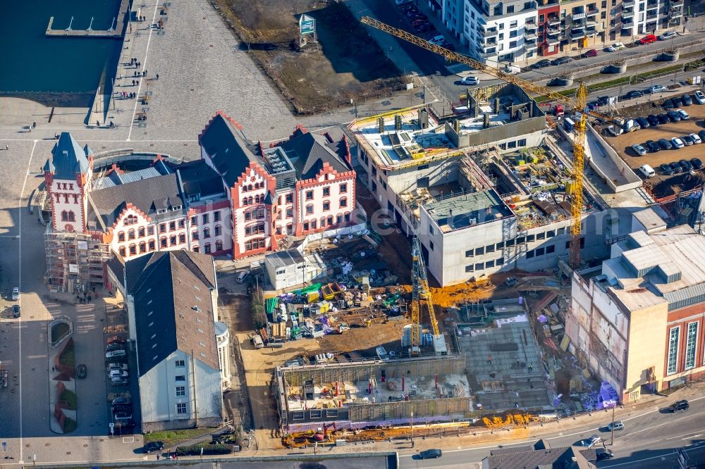 Dortmund from the bird's eye view: New residential buildings at the lake Phoenixsee beneath the roads Hoerder-Bach-Allee and Am Kai in Dortmund in North Rhine-Westphalia