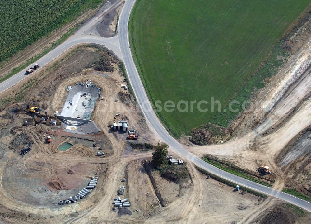 Aerial image Eisenach - Eisenach 27.08..2008 Neubautrasse der BAB A 4 - Umfahrung Hörselberge in Thüringen bei Eisenach. Im September 2007 hat das Bieterkonsortium VINCI Concessions / Hochtief PPP (50/50) den Zuschlag für das A-Modell BAB A 4 Umfahrung Hörselberge (km 238,5 bis km 283,2) erhalten. Die bei diesem Projekt auf der Bauausführungsebene gegründete Arbeitsgemeinschaft wird von der EUROVIA Infra GmbH angeführt, des Weiteren sind hier die Unternehmen Hochtief, Strassing Limes und Rädlinger beteiligt. Durchgeführt werden die im Zuge dieses Projektes notwendigen Arbeiten unter an derem von den Mitarbeitern der Niederlassung Weimar der EUROVIA Verkehrsbau Union sowie der Niederlassungen Abbruch und Erdbau, Betonstraßenbau, Ingenieurbau und TECO Schallschutz der EUROVIA Beton. DEGES