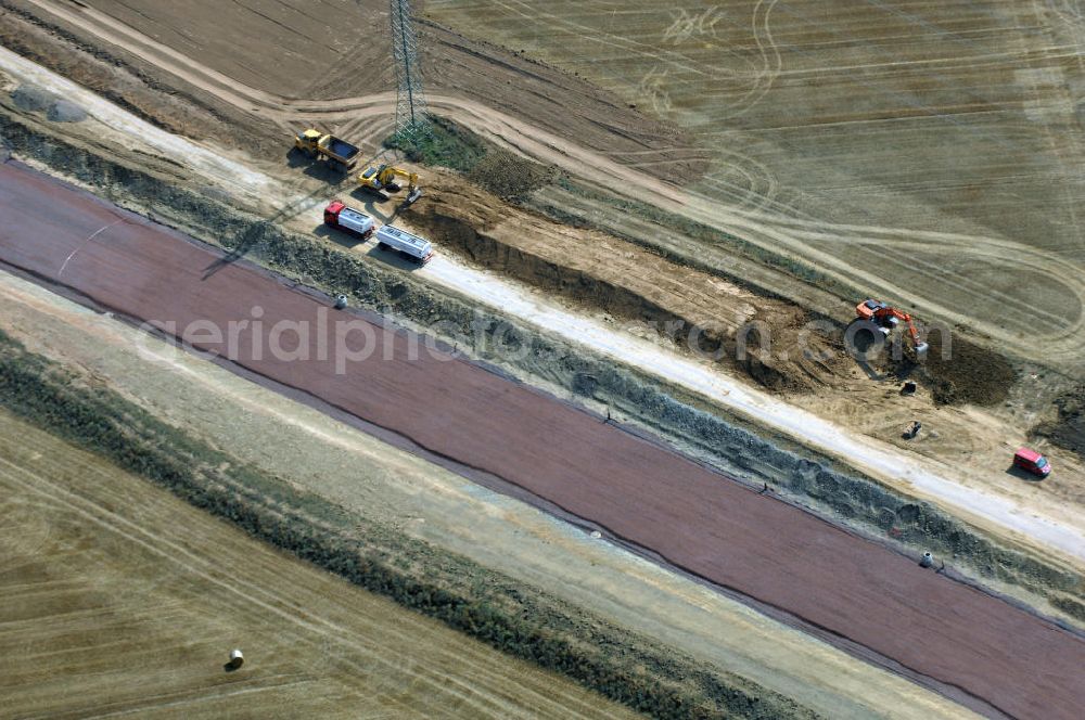 Aerial photograph Eisenach - Eisenach 27.08..2008 Neubautrasse der BAB A 4 - Umfahrung Hörselberge in Thüringen bei Eisenach. Im September 2007 hat das Bieterkonsortium VINCI Concessions / Hochtief PPP (50/50) den Zuschlag für das A-Modell BAB A 4 Umfahrung Hörselberge (km 238,5 bis km 283,2) erhalten. Die bei diesem Projekt auf der Bauausführungsebene gegründete Arbeitsgemeinschaft wird von der EUROVIA Infra GmbH angeführt, des Weiteren sind hier die Unternehmen Hochtief, Strassing Limes und Rädlinger beteiligt. Durchgeführt werden die im Zuge dieses Projektes notwendigen Arbeiten unter an derem von den Mitarbeitern der Niederlassung Weimar der EUROVIA Verkehrsbau Union sowie der Niederlassungen Abbruch und Erdbau, Betonstraßenbau, Ingenieurbau und TECO Schallschutz der EUROVIA Beton. DEGES