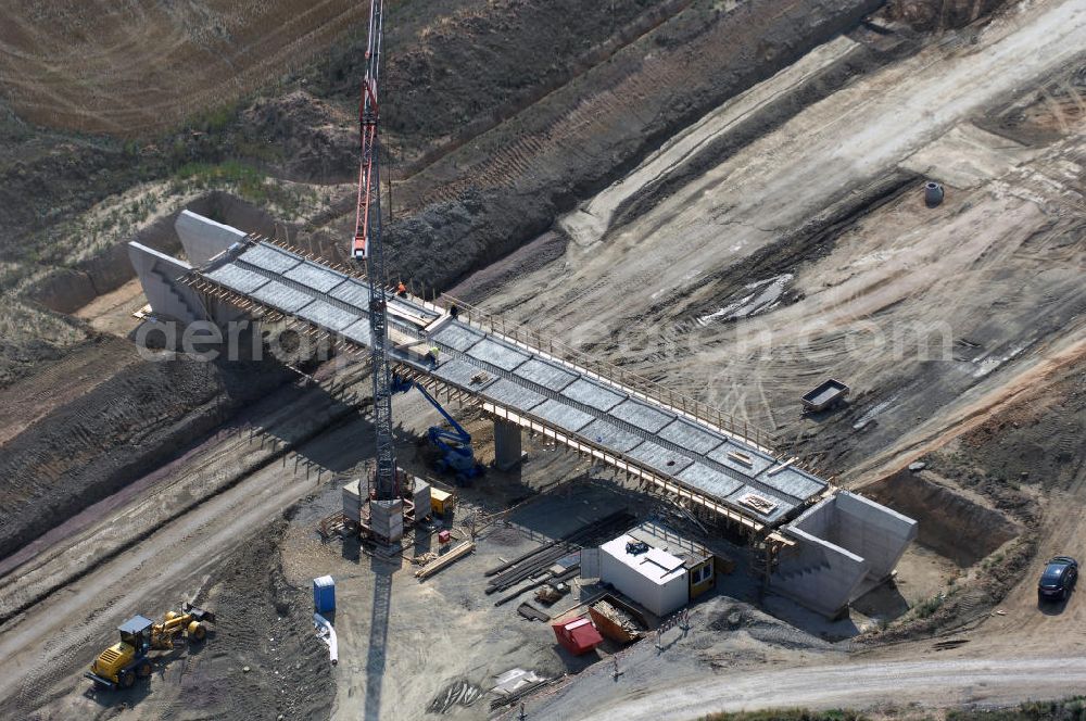 Aerial photograph Eisenach - Eisenach 27.08..2008 Neubautrasse der BAB A 4 - Umfahrung Hörselberge in Thüringen bei Eisenach. Im September 2007 hat das Bieterkonsortium VINCI Concessions / Hochtief PPP (50/50) den Zuschlag für das A-Modell BAB A 4 Umfahrung Hörselberge (km 238,5 bis km 283,2) erhalten. Die bei diesem Projekt auf der Bauausführungsebene gegründete Arbeitsgemeinschaft wird von der EUROVIA Infra GmbH angeführt, des Weiteren sind hier die Unternehmen Hochtief, Strassing Limes und Rädlinger beteiligt. Durchgeführt werden die im Zuge dieses Projektes notwendigen Arbeiten unter an derem von den Mitarbeitern der Niederlassung Weimar der EUROVIA Verkehrsbau Union sowie der Niederlassungen Abbruch und Erdbau, Betonstraßenbau, Ingenieurbau und TECO Schallschutz der EUROVIA Beton. DEGES