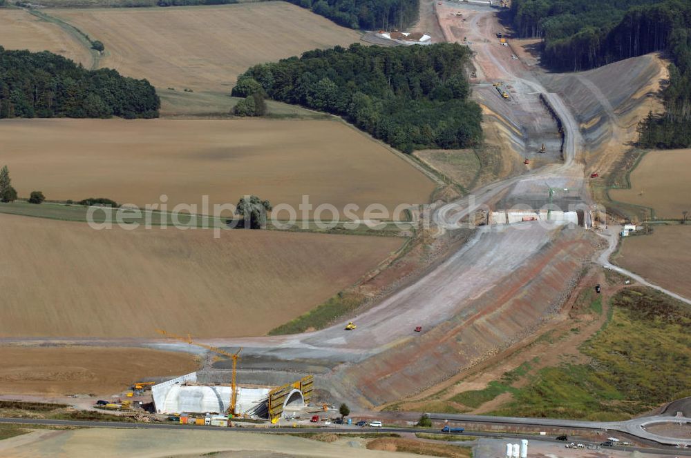 Aerial photograph Eisenach - Eisenach 27.08..2008 Neubautrasse der BAB A 4 - Umfahrung Hörselberge in Thüringen bei Eisenach. Im September 2007 hat das Bieterkonsortium VINCI Concessions / Hochtief PPP (50/50) den Zuschlag für das A-Modell BAB A 4 Umfahrung Hörselberge (km 238,5 bis km 283,2) erhalten. Die bei diesem Projekt auf der Bauausführungsebene gegründete Arbeitsgemeinschaft wird von der EUROVIA Infra GmbH angeführt, des Weiteren sind hier die Unternehmen Hochtief, Strassing Limes und Rädlinger beteiligt. Durchgeführt werden die im Zuge dieses Projektes notwendigen Arbeiten unter an derem von den Mitarbeitern der Niederlassung Weimar der EUROVIA Verkehrsbau Union sowie der Niederlassungen Abbruch und Erdbau, Betonstraßenbau, Ingenieurbau und TECO Schallschutz der EUROVIA Beton. DEGES