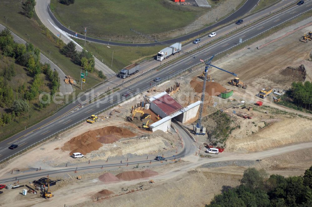 Eisenach from the bird's eye view: Eisenach 27.08..2008 Neubautrasse der BAB A 4 - Umfahrung Hörselberge in Thüringen bei Eisenach. Im September 2007 hat das Bieterkonsortium VINCI Concessions / Hochtief PPP (50/50) den Zuschlag für das A-Modell BAB A 4 Umfahrung Hörselberge (km 238,5 bis km 283,2) erhalten. Die bei diesem Projekt auf der Bauausführungsebene gegründete Arbeitsgemeinschaft wird von der EUROVIA Infra GmbH angeführt, des Weiteren sind hier die Unternehmen Hochtief, Strassing Limes und Rädlinger beteiligt. Durchgeführt werden die im Zuge dieses Projektes notwendigen Arbeiten unter an derem von den Mitarbeitern der Niederlassung Weimar der EUROVIA Verkehrsbau Union sowie der Niederlassungen Abbruch und Erdbau, Betonstraßenbau, Ingenieurbau und TECO Schallschutz der EUROVIA Beton. DEGES