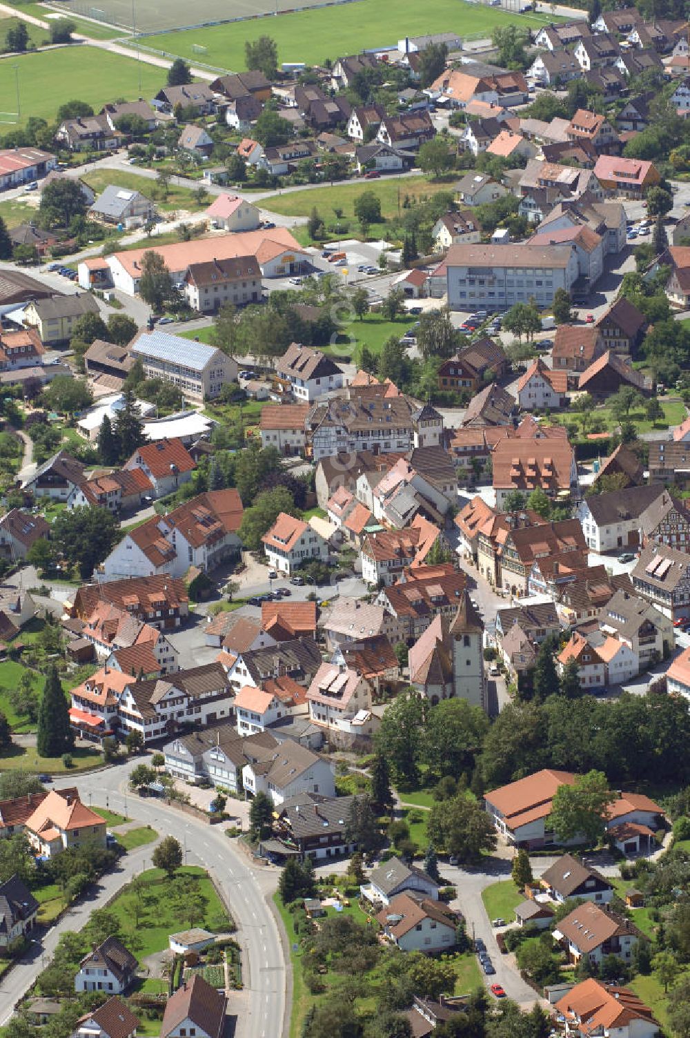 Neubulach from the bird's eye view: Neubulach mit Stadtkirche. Dieser Luftkurort kiegt im Nordschwarzwald und ist der erste Ort in Deutschland mit staatlich anerkanntem Heilstollen-Kurbetrieb.