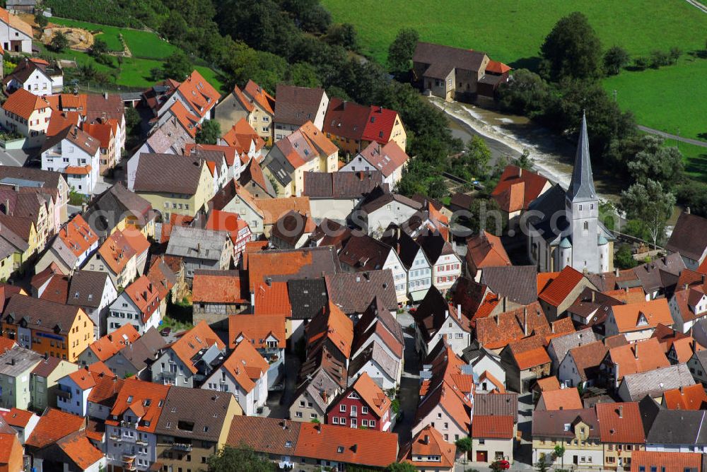 Aerial image Neudenau - Blick auf den Stadtkern Neudenaus mit Pfarrkirche St. Laurentius. Sie ist eine katholische, barocke Kirche und geht auf ein wesentlich älteres gotisches Vorgängerbauwerk zurück. Kontakt: Stadtverwaltung Neudenau Rathaus Siglingen, Bürgermeister Manfred Hebeiß, Heilbronner Straße 29 74861 Neudenau-Siglingen, Tel. +49(0)6298 92716 0, Fax +49(0)6298 92716 49, Email: zentrale@neudenau.de