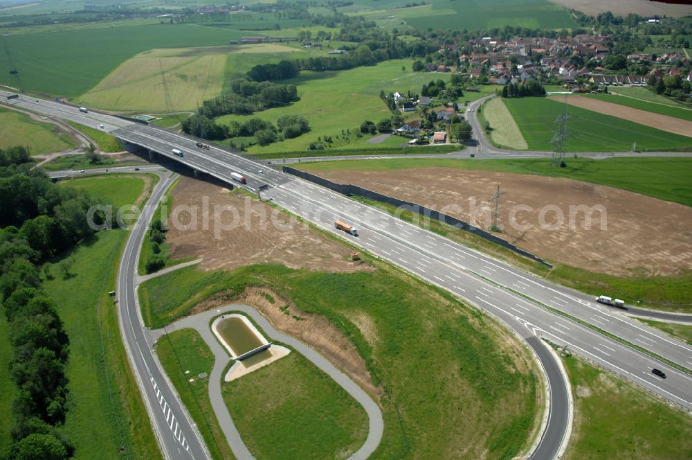 Aerial photograph Großenlupnitz - Blick auf die Böbertalbrücke mit einer Länge von 370 m. Die Brücke ist Teil des Projekt Nordverlegung / Umfahrung Hörselberge der Autobahn E40 / A4 in Thüringen bei Eisenach. Durchgeführt wurden die im Zuge dieses Projektes notwendigen Arbeiten unter an derem von den Mitarbeitern der Niederlassung Weimar der EUROVIA Verkehrsbau Union sowie der Niederlassungen Abbruch und Erdbau, Betonstraßenbau, Ingenieurbau und TECO Schallschutz der EUROVIA Beton sowie der DEGES. View of the new Böbertal - bridge on the motorway course E40 / A4 in thuringia near Großenlupnitz.