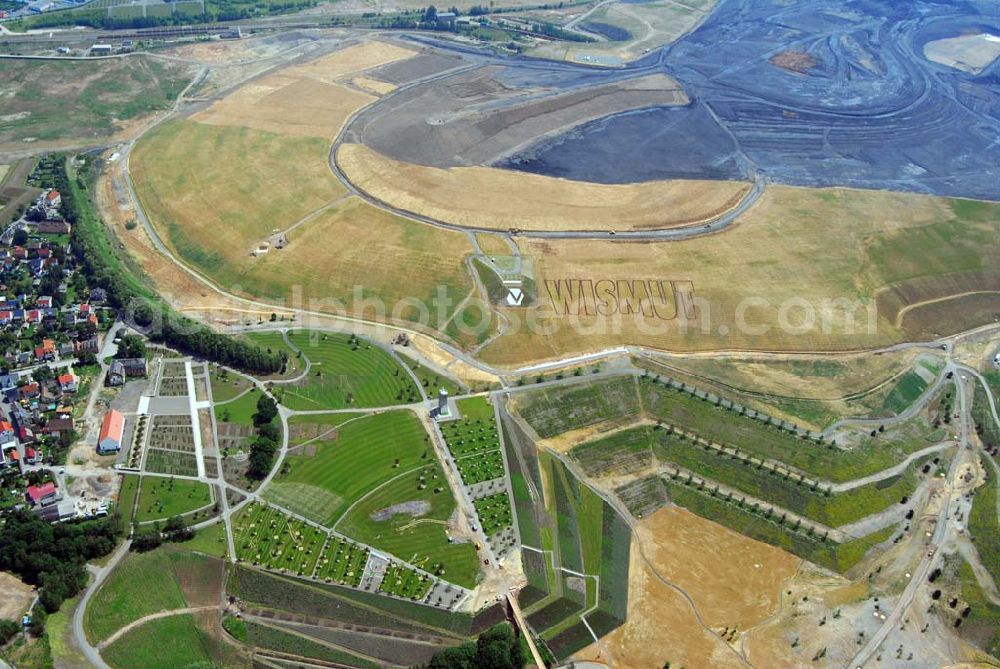 Aerial image Ronneburg - - Auf dem Ronneburger Gelände der Bundesgartenschau 2007 (Buga), einem ehemaligen Uranabbaugebiet der Wismut, gibt es keine gefährliche radioaktive Strahlung mehr. Das ist das Ergebnis einer Expertise des Öko-Instituts Darmstadt. Die Gartenschau soll vom 27. April 2007 an mindestens 1,5 Millionen Besucher nach Gera und Ronneburg locken. Die unabhängigen Ingenieure analysierten Messwerte, die in den vergangenen Jahren von der Wismut und an deren Institutionen erhoben wurden.