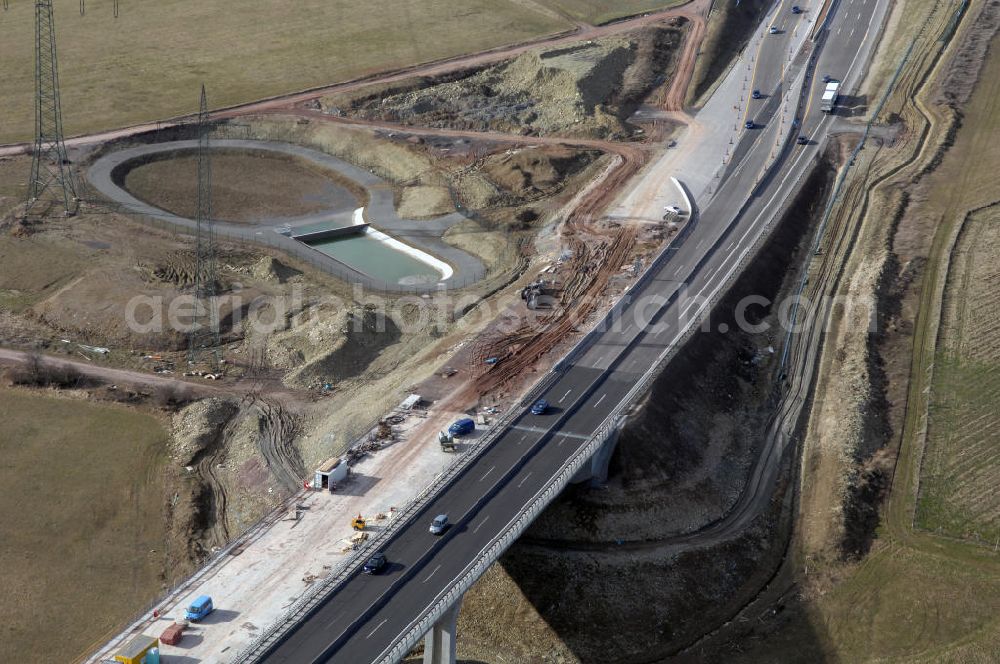 Aerial image Ettenhausen - Blick auf die neue Nessetalbrücke mit einer Länge von 380 m und einem Regenrückhaltebecken nach der teilweisen Verkehrsfreigabe der A4 / E40. Die Brücke ist Teil des Projekt Nordverlegung / Umfahrung Hörselberge der Autobahn E40 / A4 in Thüringen bei Eisenach. Durchgeführt werden die im Zuge dieses Projektes notwendigen Arbeiten durch die EUROVIA Verkehrsbau Union sowie der Niederlassungen Abbruch und Erdbau, Betonstraßenbau, Ingenieurbau und TECO Schallschutz der EUROVIA Beton sowi???????????????????????????????????????????????????????????????????????????????????????????????