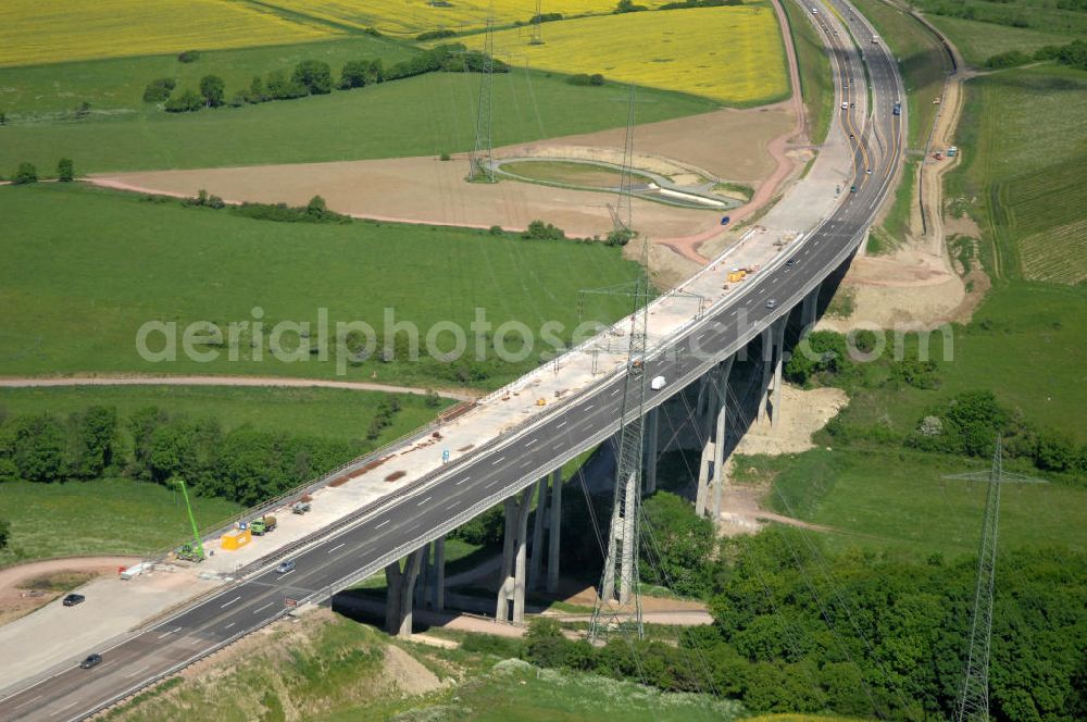 Ettenhausen from the bird's eye view: Blick auf die neue Nessetalbrücke mit einer Länge von 380 m und einem Regenrückhaltebecken nach der teilweisen Verkehrsfreigabe der A4 / E40. Die Brücke ist Teil des Projekt Nordverlegung / Umfahrung Hörselberge der Autobahn E40 / A4 in Thüringen bei Eisenach. Durchgeführt werden die im Zuge dieses Projektes notwendigen Arbeiten durch die EUROVIA Verkehrsbau Union sowie der Niederlassungen Abbruch und Erdbau, Betonstraßenbau, Ingenieurbau und TECO Schallschutz der EUROVIA Beton sowi???????????????????????????????????????????????????????????????????????????????????????????????