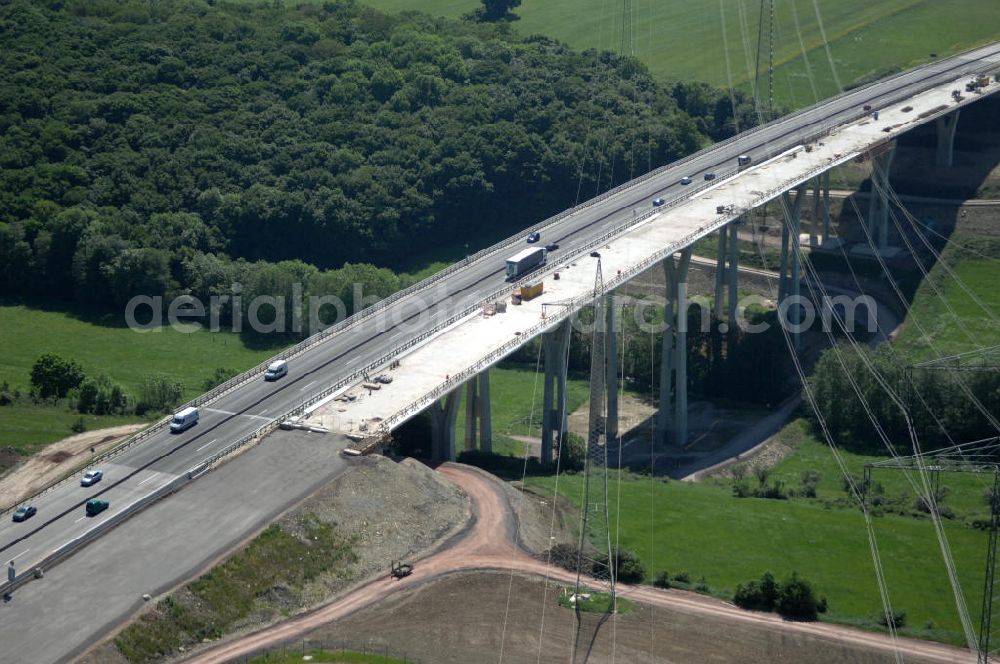 Aerial photograph Ettenhausen - Blick auf die neue Nessetalbrücke mit einer Länge von 380 m und einem Regenrückhaltebecken nach der teilweisen Verkehrsfreigabe der A4 / E40. Die Brücke ist Teil des Projekt Nordverlegung / Umfahrung Hörselberge der Autobahn E40 / A4 in Thüringen bei Eisenach. Durchgeführt werden die im Zuge dieses Projektes notwendigen Arbeiten durch die EUROVIA Verkehrsbau Union sowie der Niederlassungen Abbruch und Erdbau, Betonstraßenbau, Ingenieurbau und TECO Schallschutz der EUROVIA Beton sowi???????????????????????????????????????????????????????????????????????????????????????????????