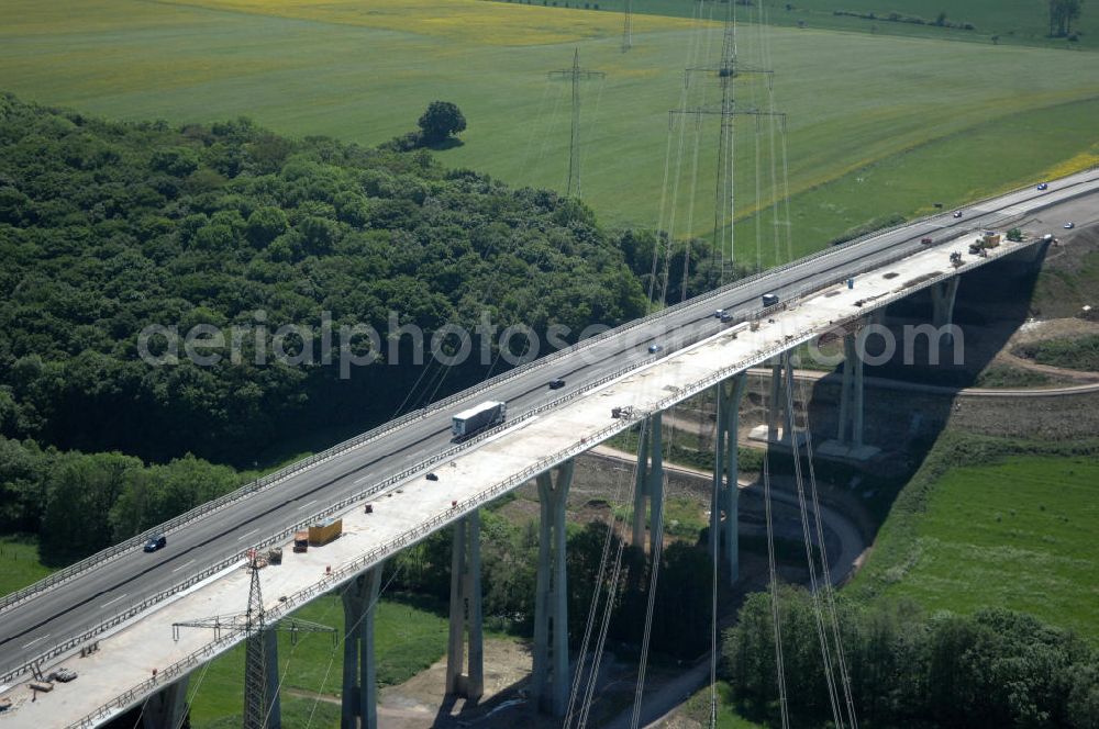 Ettenhausen from the bird's eye view: Blick auf die neue Nessetalbrücke mit einer Länge von 380 m und einem Regenrückhaltebecken nach der teilweisen Verkehrsfreigabe der A4 / E40. Die Brücke ist Teil des Projekt Nordverlegung / Umfahrung Hörselberge der Autobahn E40 / A4 in Thüringen bei Eisenach. Durchgeführt werden die im Zuge dieses Projektes notwendigen Arbeiten durch die EUROVIA Verkehrsbau Union sowie der Niederlassungen Abbruch und Erdbau, Betonstraßenbau, Ingenieurbau und TECO Schallschutz der EUROVIA Beton sowi???????????????????????????????????????????????????????????????????????????????????????????????