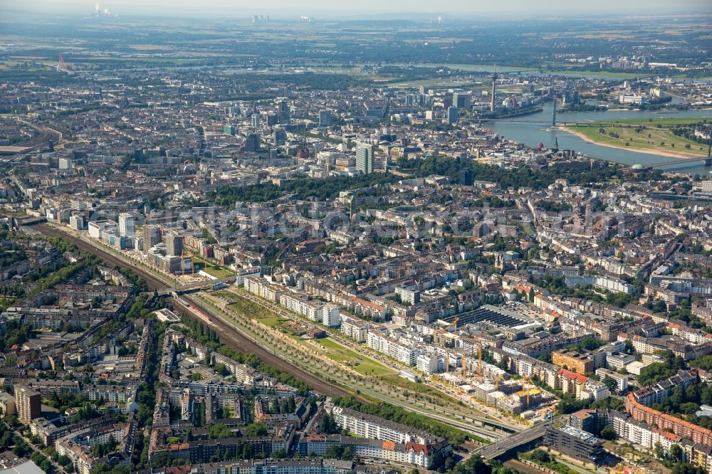 Düsseldorf from the bird's eye view: New City Quarters and Le Quartier Central in Duesseldorf in the state of North Rhine-Westphalia. The former railway and commercial area is being redeveloped and new residential buildings and parks are being created along Toulouser Allee