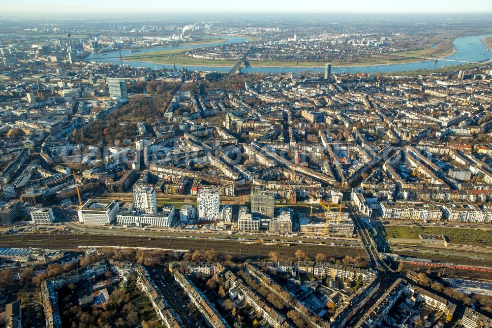 Aerial photograph Düsseldorf - New City Quarters and Le Quartier Central in Duesseldorf in the state of North Rhine-Westphalia. The former railway and commercial area is being redeveloped and new residential buildings and parks are being created along Toulouser Allee