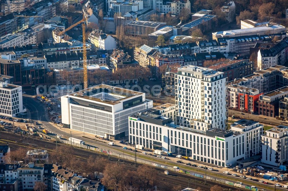 Düsseldorf from the bird's eye view: New City Quarters and Le Quartier Central in Duesseldorf in the state of North Rhine-Westphalia. The former railway and commercial area is being redeveloped and new residential buildings and parks are being created along Toulouser Allee