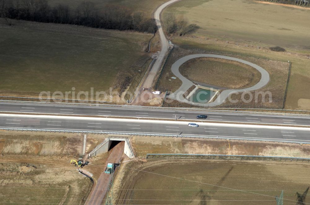 Aerial image Großenlupnitz - Blick auf den neuen E40 / A4 - Autobahnverlauf in Thüringen nach der teilweisen Verkehrsfreigabe. Durchgeführt werden die im Zuge dieses Projektes notwendigen Arbeiten unter an derem von EUROVIA Verkehrsbau Union sowie der Niederlassungen Abbruch und Erdbau, Betonstraßenbau, Ingenieurbau und TECO Schallschutz der EUROVIA Beton sowie der DEGES. View of the new A4 motorway course E40 / A4 near großenlupnitz in thuringia.