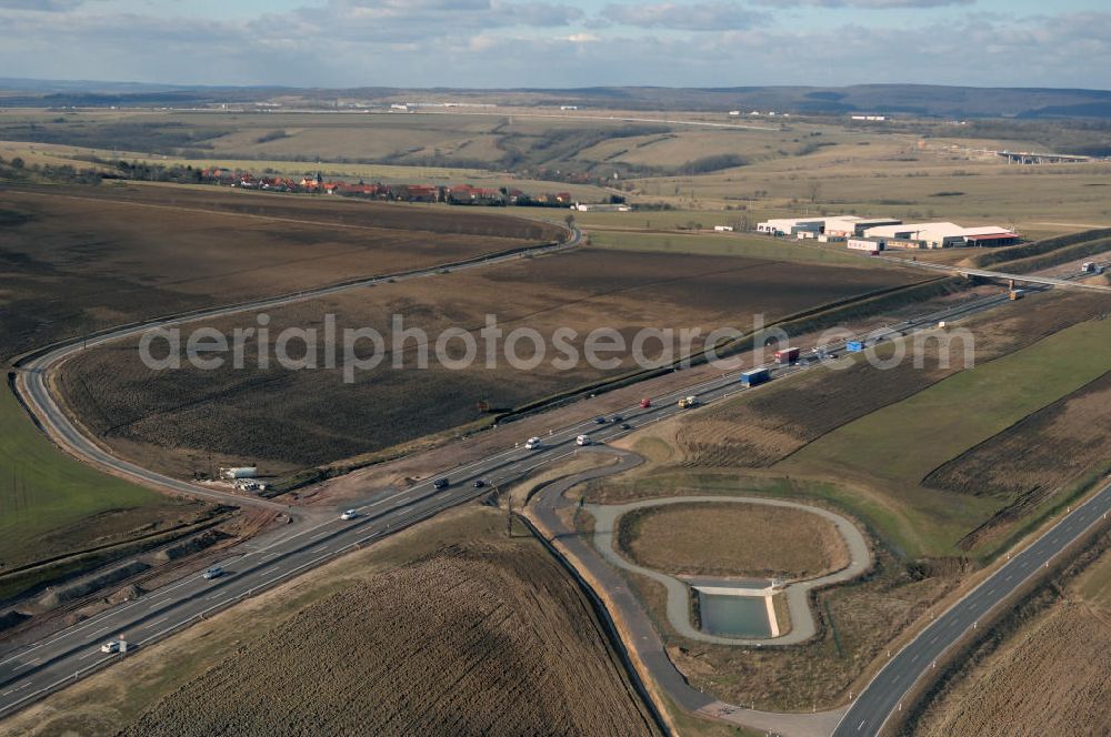 Aerial image Hastrungsfeld - Blick auf den neuen E40 / A4 - Autobahnverlauf in Thüringen nach der teilweisen Verkehrsfreigabe. Durchgeführt werden die im Zuge dieses Projektes notwendigen Arbeiten unter an derem von EUROVIA Verkehrsbau Union sowie der Niederlassungen Abbruch und Erdbau, Betonstraßenbau, Ingenieurbau und TECO Schallschutz der EUROVIA Beton sowie der DEGES. View of the new A4 motorway course E40 / A4 in thuringia.