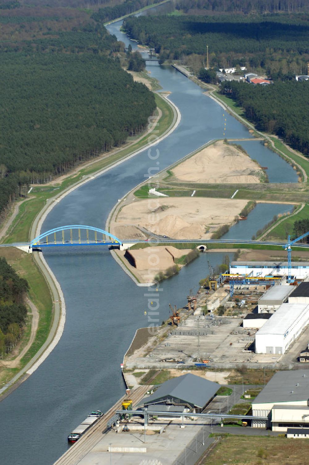 Aerial image Eberswalde - Blick auf den verlegten Oder-Havel-Kanal. Dieser wurde für den Betrieb mit hochseetauglichen Schiffen ausgebaut. Dazu wurde nördlich von Eberswalde das Kanalbett umgeleitet, um als Ersatz für die Kanalbrücke einen Tunnel unter dem neuen Kanal zu bauen.