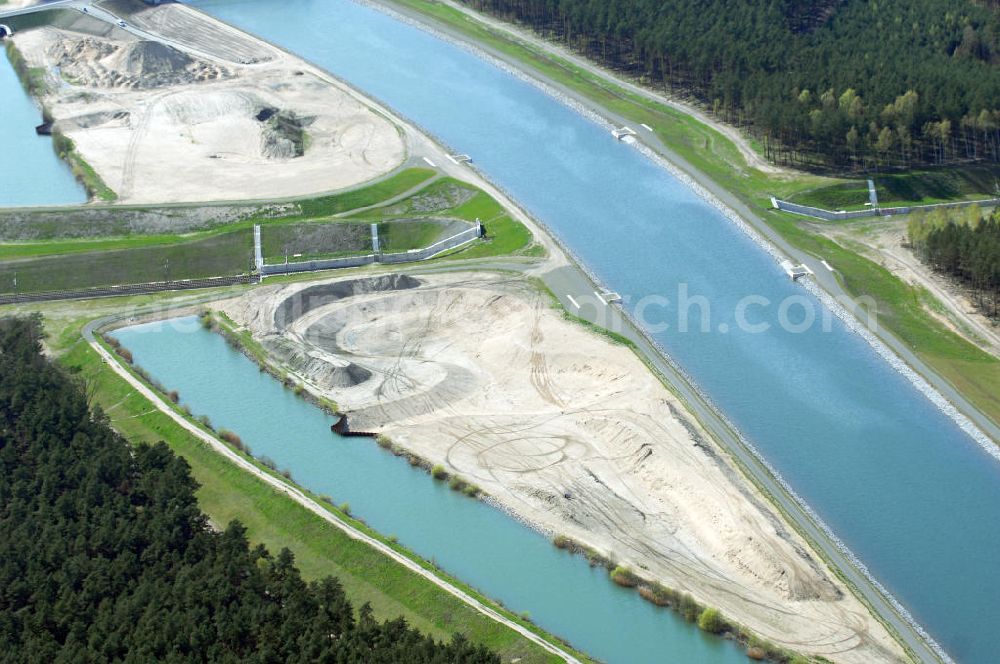 Aerial image Eberswalde - Blick auf den verlegten Oder-Havel-Kanal. Dieser wurde für den Betrieb mit hochseetauglichen Schiffen ausgebaut. Dazu wurde nördlich von Eberswalde das Kanalbett umgeleitet, um als Ersatz für die Kanalbrücke einen Tunnel unter dem neuen Kanal zu bauen.