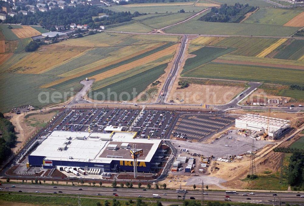 Aerial image Koblenz - : Neueröffnung des ersten IKEA Möbel-Kompetenz-Zentrum in Deutschland auf insgesamt 115.000 Quadratmetern Grundstücksfläche.In den Zentren haben Einzelhändler rund um das Thema „Wohnen“ die Möglichkeit, Verkaufsflächen anzumieten. Es werden zusätzliche 150 Arbeitsplätze geschaffen. Als erster Partner von IKEA wird die Firma Saturn Ende Oktober 2006 einen Markt eröffnen. Die gesamten Investitionskosten in das Möbel-Kompetenz-Zentrum betragen ca. 45 Mio. Euro. Es werden ca. 2.075 Parkplätze für Kunden zur Verfügung stehen. Weitere Zentren sind unter an derem in Würzburg, Köln und Bremen geplant.