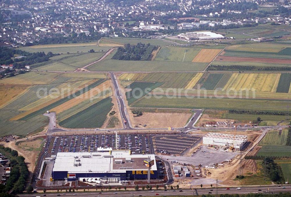 Koblenz from the bird's eye view: : Neueröffnung des ersten IKEA Möbel-Kompetenz-Zentrum in Deutschland auf insgesamt 115.000 Quadratmetern Grundstücksfläche.In den Zentren haben Einzelhändler rund um das Thema „Wohnen“ die Möglichkeit, Verkaufsflächen anzumieten. Es werden zusätzliche 150 Arbeitsplätze geschaffen. Als erster Partner von IKEA wird die Firma Saturn Ende Oktober 2006 einen Markt eröffnen. Die gesamten Investitionskosten in das Möbel-Kompetenz-Zentrum betragen ca. 45 Mio. Euro. Es werden ca. 2.075 Parkplätze für Kunden zur Verfügung stehen. Weitere Zentren sind unter an derem in Würzburg, Köln und Bremen geplant.