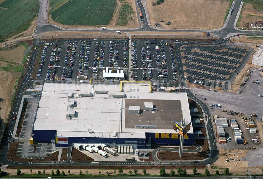 Aerial photograph Koblenz - : Neueröffnung des ersten IKEA Möbel-Kompetenz-Zentrum in Deutschland auf insgesamt 115.000 Quadratmetern Grundstücksfläche.In den Zentren haben Einzelhändler rund um das Thema „Wohnen“ die Möglichkeit, Verkaufsflächen anzumieten. Es werden zusätzliche 150 Arbeitsplätze geschaffen. Als erster Partner von IKEA wird die Firma Saturn Ende Oktober 2006 einen Markt eröffnen. Die gesamten Investitionskosten in das Möbel-Kompetenz-Zentrum betragen ca. 45 Mio. Euro. Es werden ca. 2.075 Parkplätze für Kunden zur Verfügung stehen. Weitere Zentren sind unter an derem in Würzburg, Köln und Bremen geplant.